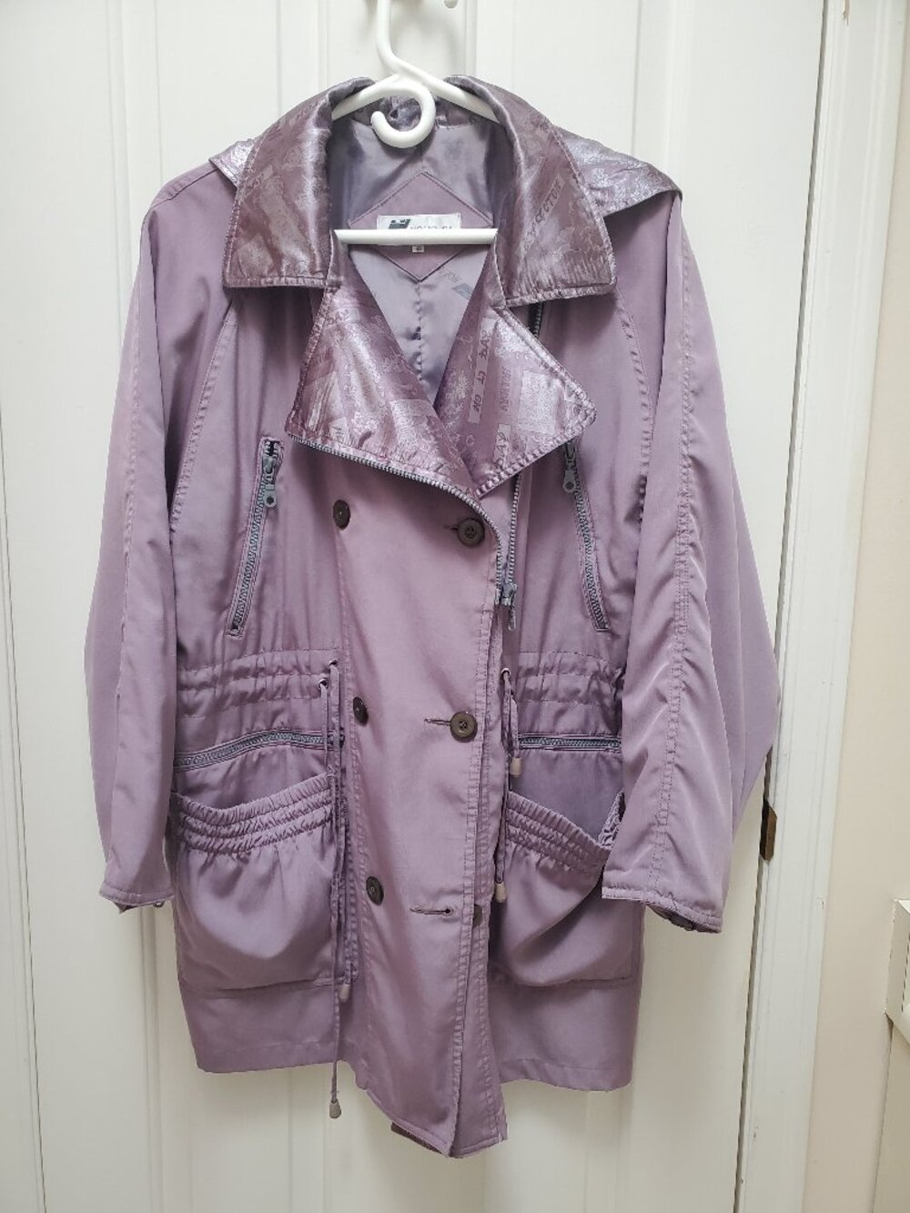 90th style jacket with zippered pockets and removable hood